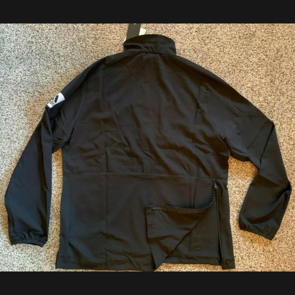 Woman’s large adidas black game mode long sleeve.